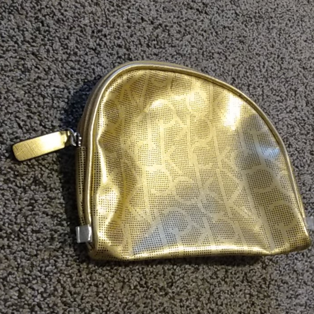 Calvin klein gold makeup bag